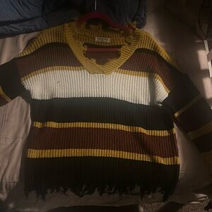 Sweater With ruffled ends